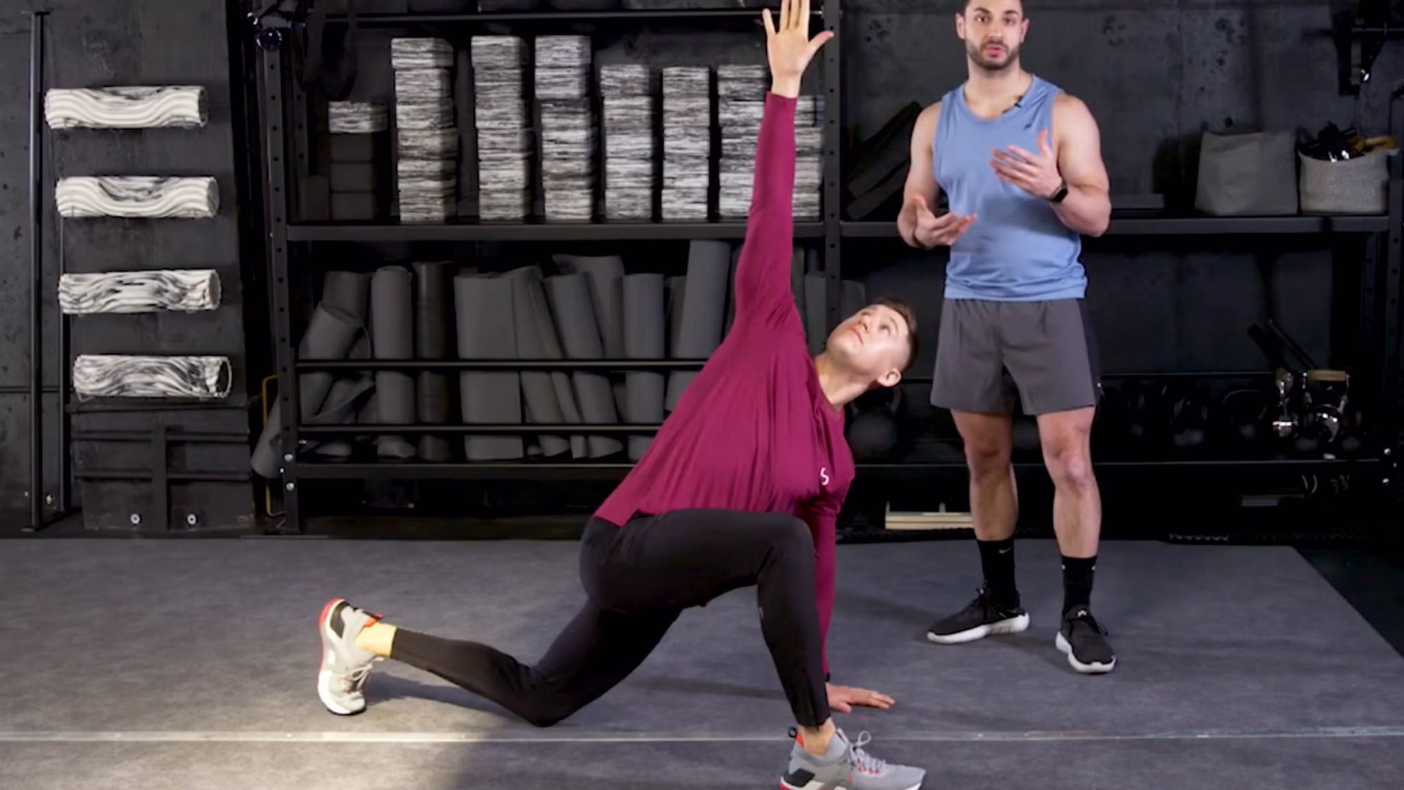 Person receiving assisted stretching therapy
